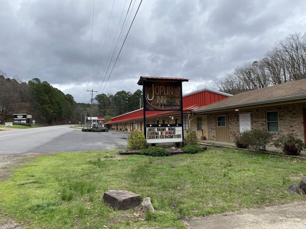 Queen Guest Room located at the Joplin Inn on the highway at the entrance to Mountain Harbor, 2 1/2 miles from Lake Ouachita. by RedAwning