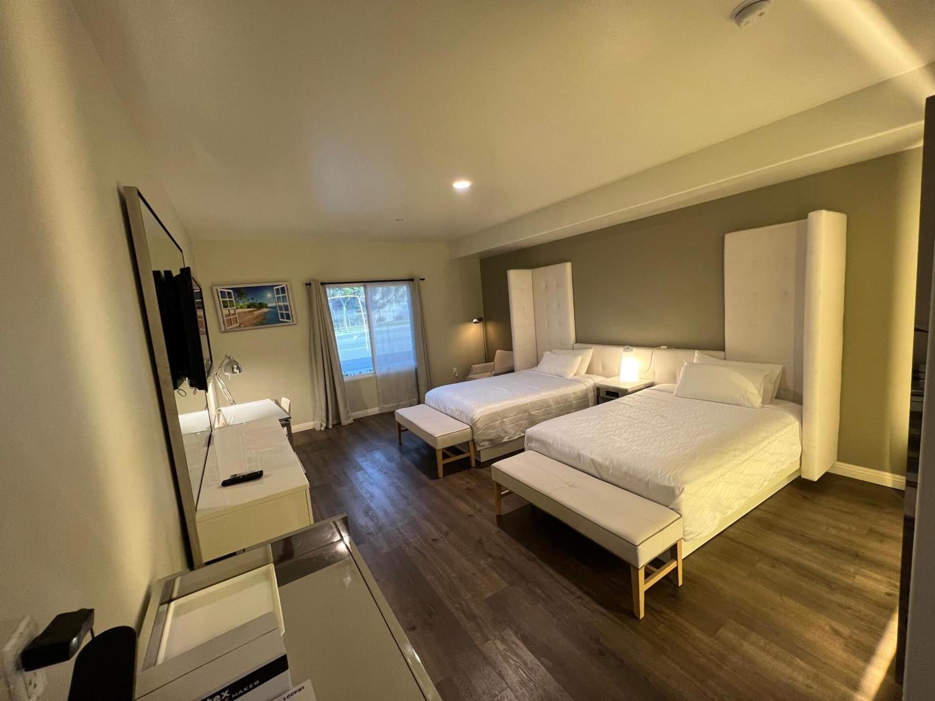ASPIRE INN & SUITES Orange photo 16