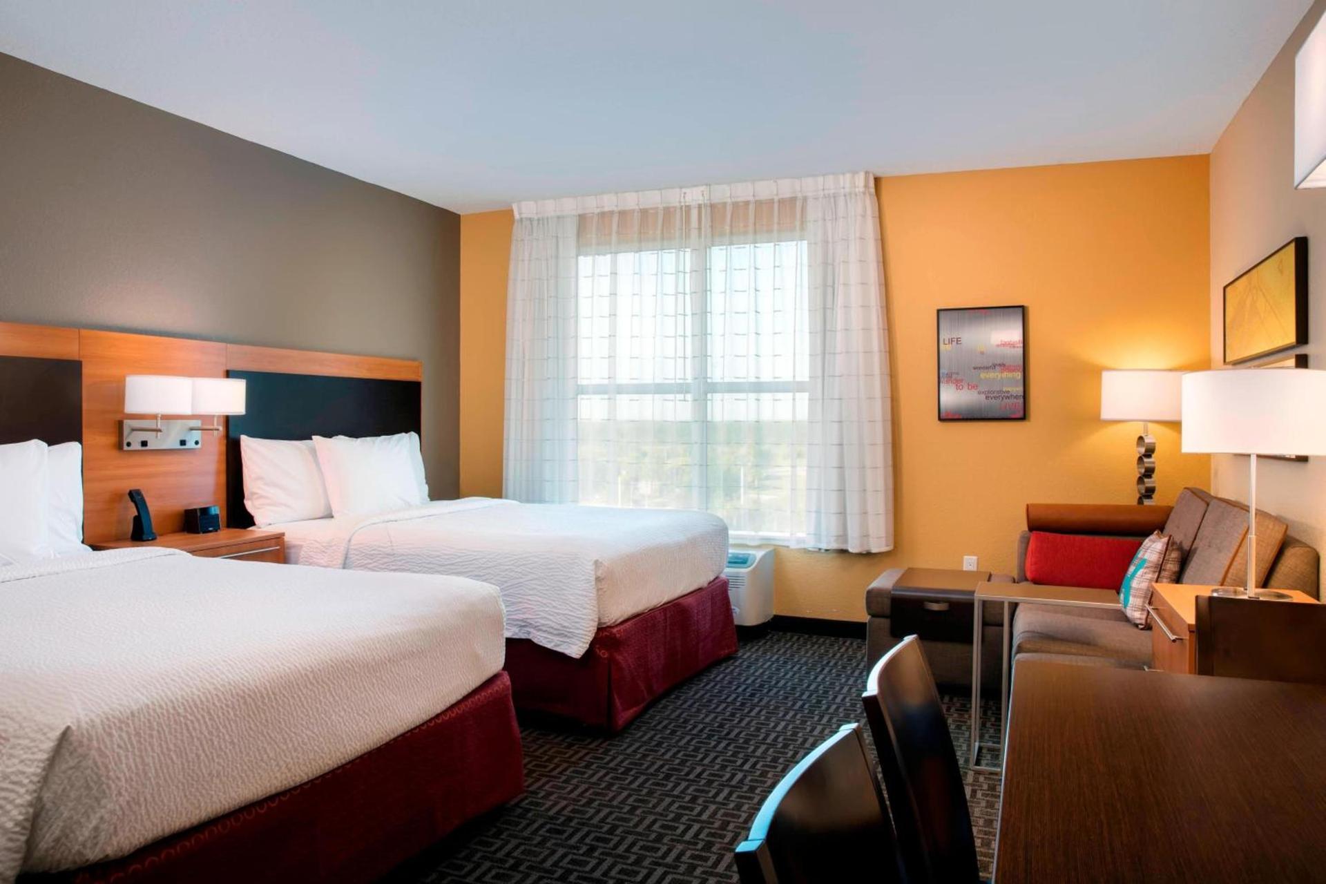 TownePlace Suites Orlando at FLAMINGO CROSSINGS Town Center, Western Entrance photo 18