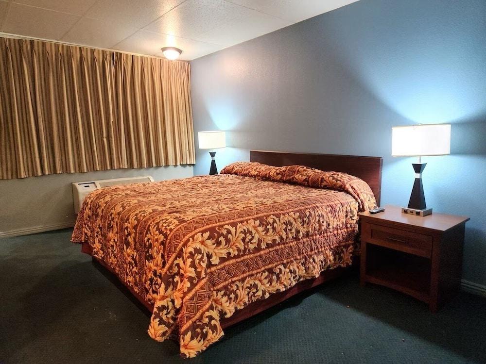 Executive Inn By OYO Queenville Mena photo 12
