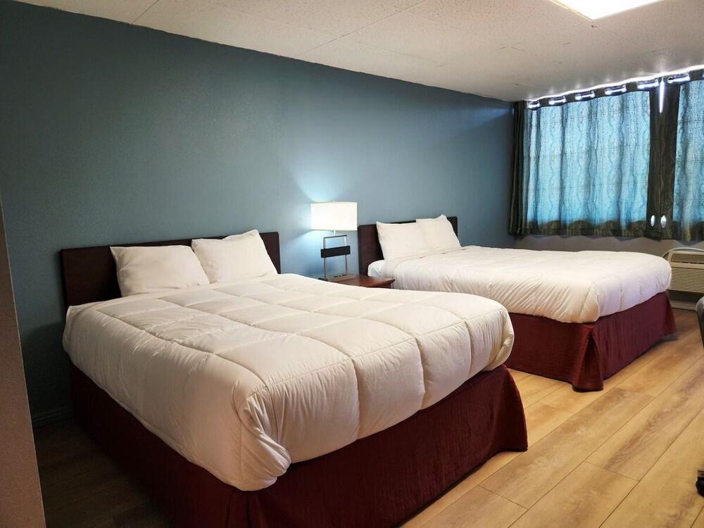 Executive Inn By OYO Queenville Mena photo 15