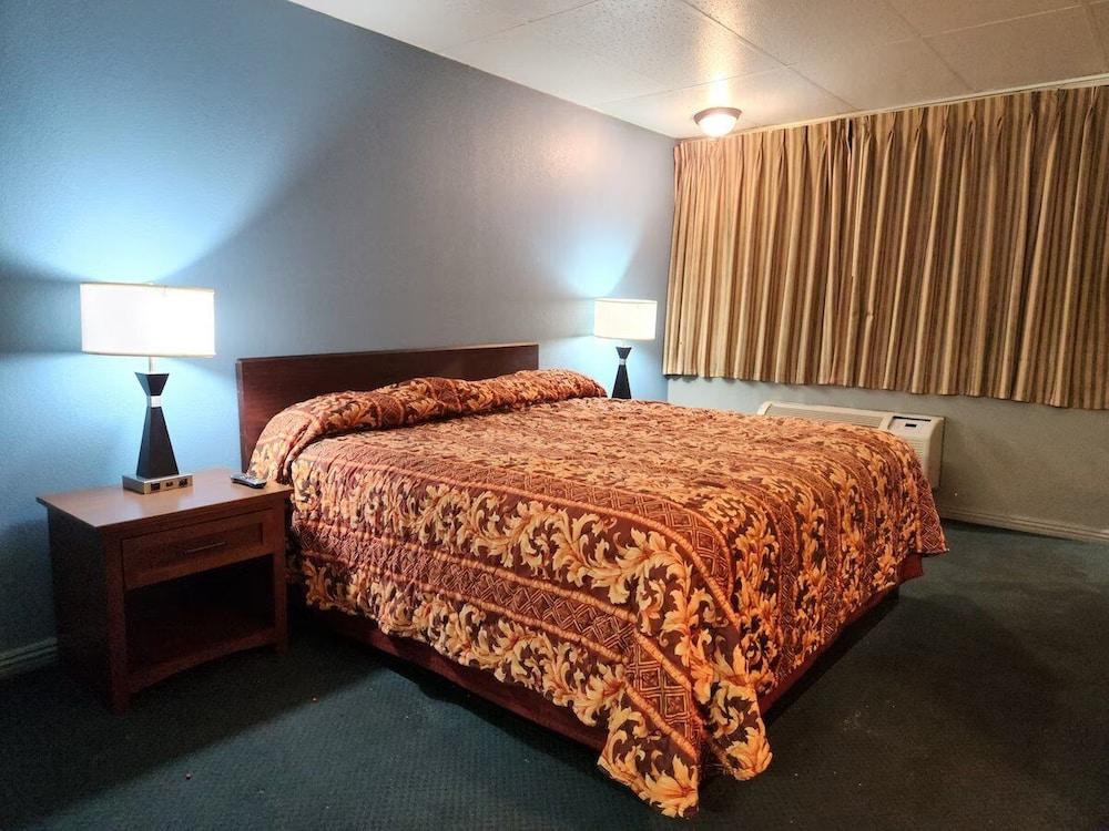 Executive Inn By OYO Queenville Mena photo 11