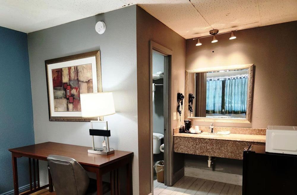 Executive Inn By OYO Queenville Mena photo 14