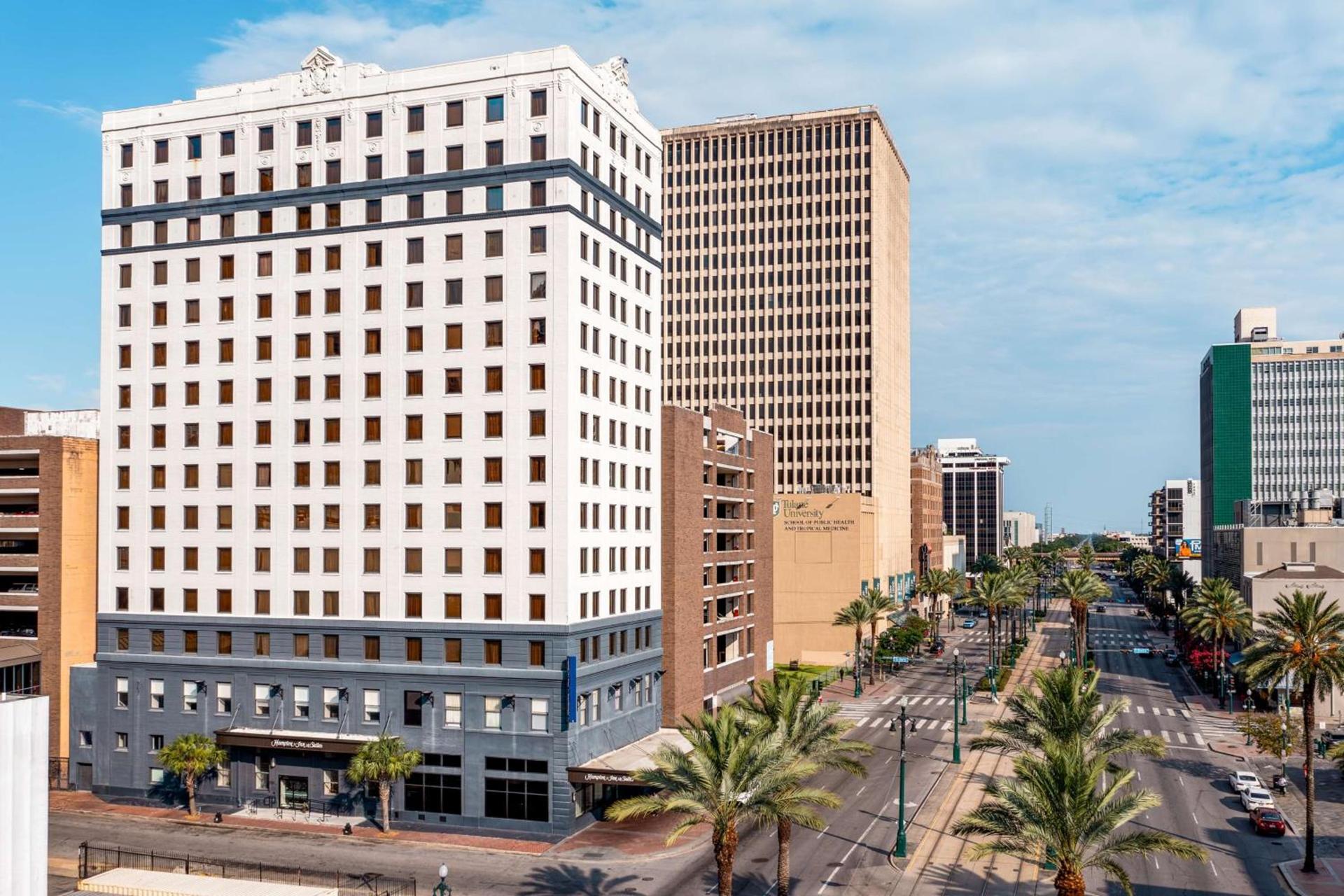 A sunny day on palm-lined Canal Street in downtown New Orleans